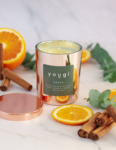 Yougi Peace candle in a copper glass jar