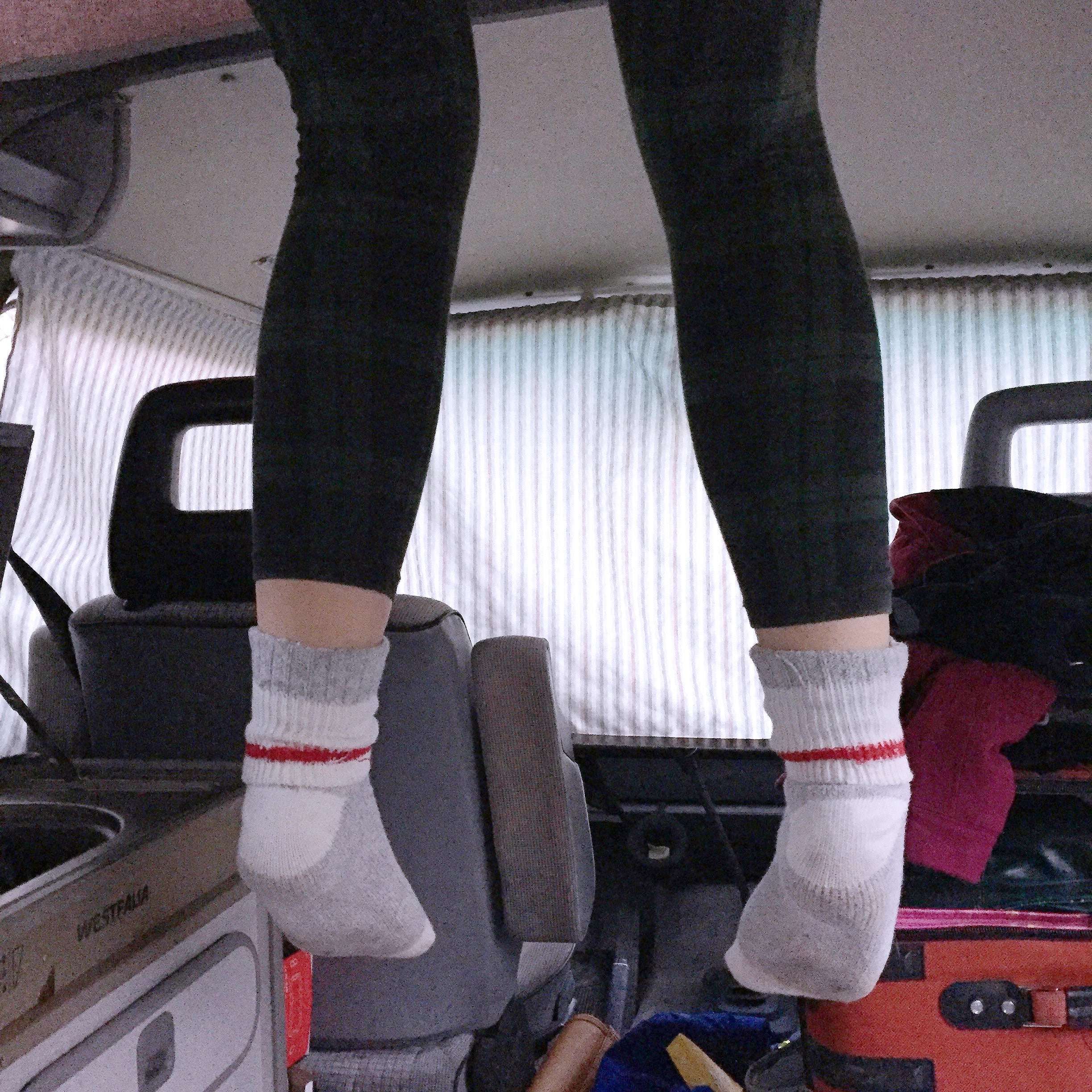 Erin's feet in the Westfalia Camper