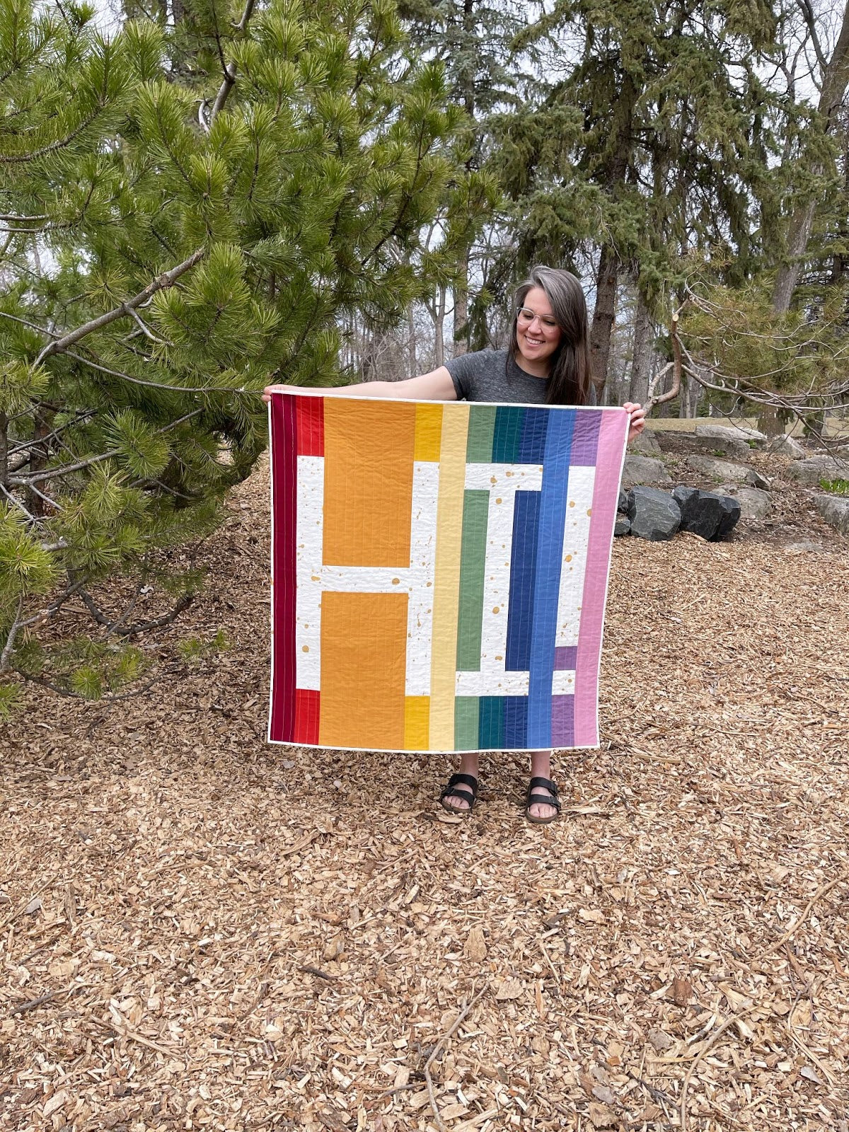 Erin Holding Rainbow HI Quilt 