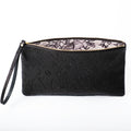 black leather floral embossed clutch bag with lace print lining