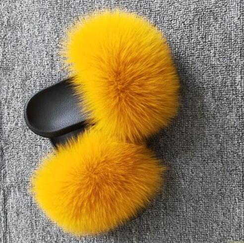 yellow fox fur slides