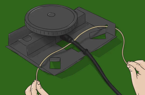 Loop a rope through the prefabricated holes on the base