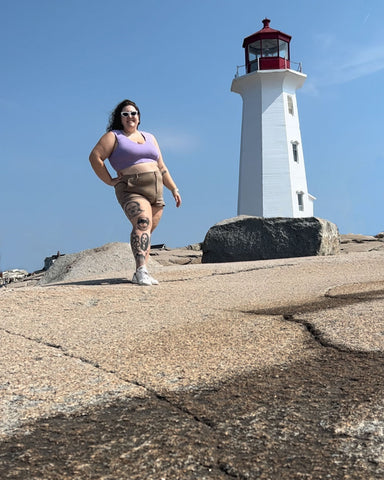 Vera wearing Kinflyte's Freedom Bra Midi - Eco Jersey, a back support bra, shoulder support bra.