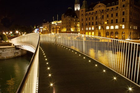 City centre bridge with walkover lights