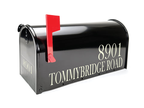 black mailbox with light brown lettering