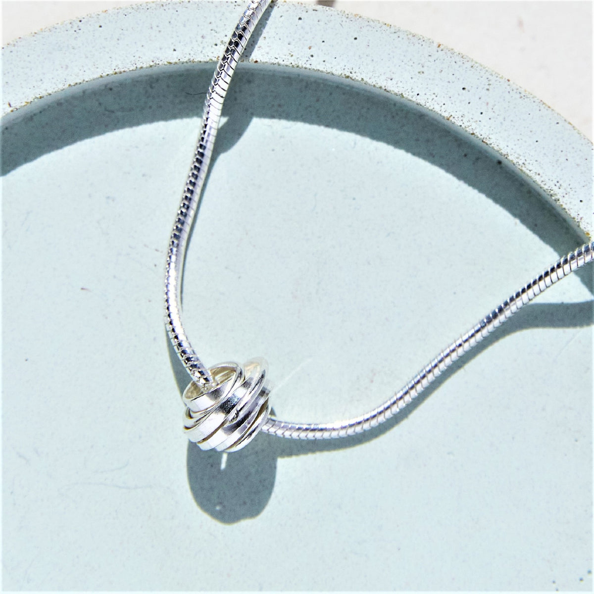 Sterling Silver Coil Charm Bracelet | Otis Jaxon Silver Jewellery