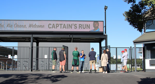 Guests stand at entrance to Mount Smart Stadium