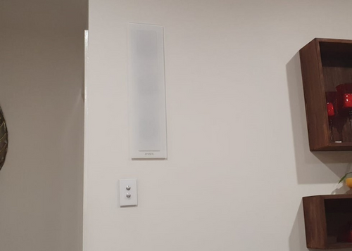 white speakers blends into wall beautifully