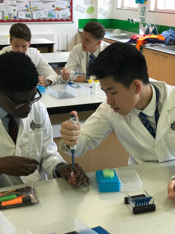 students using micropipette