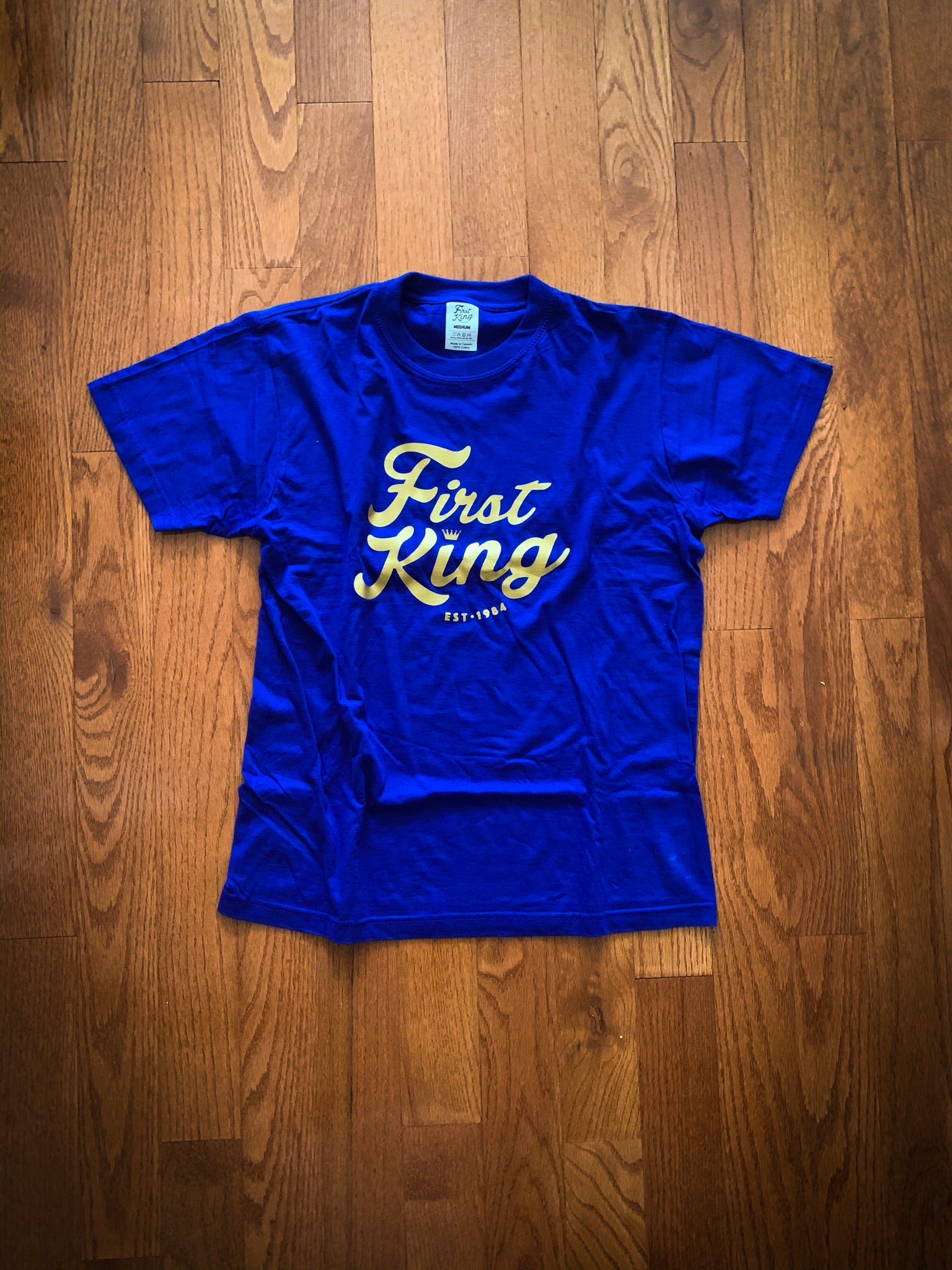 royal blue and gold shirt