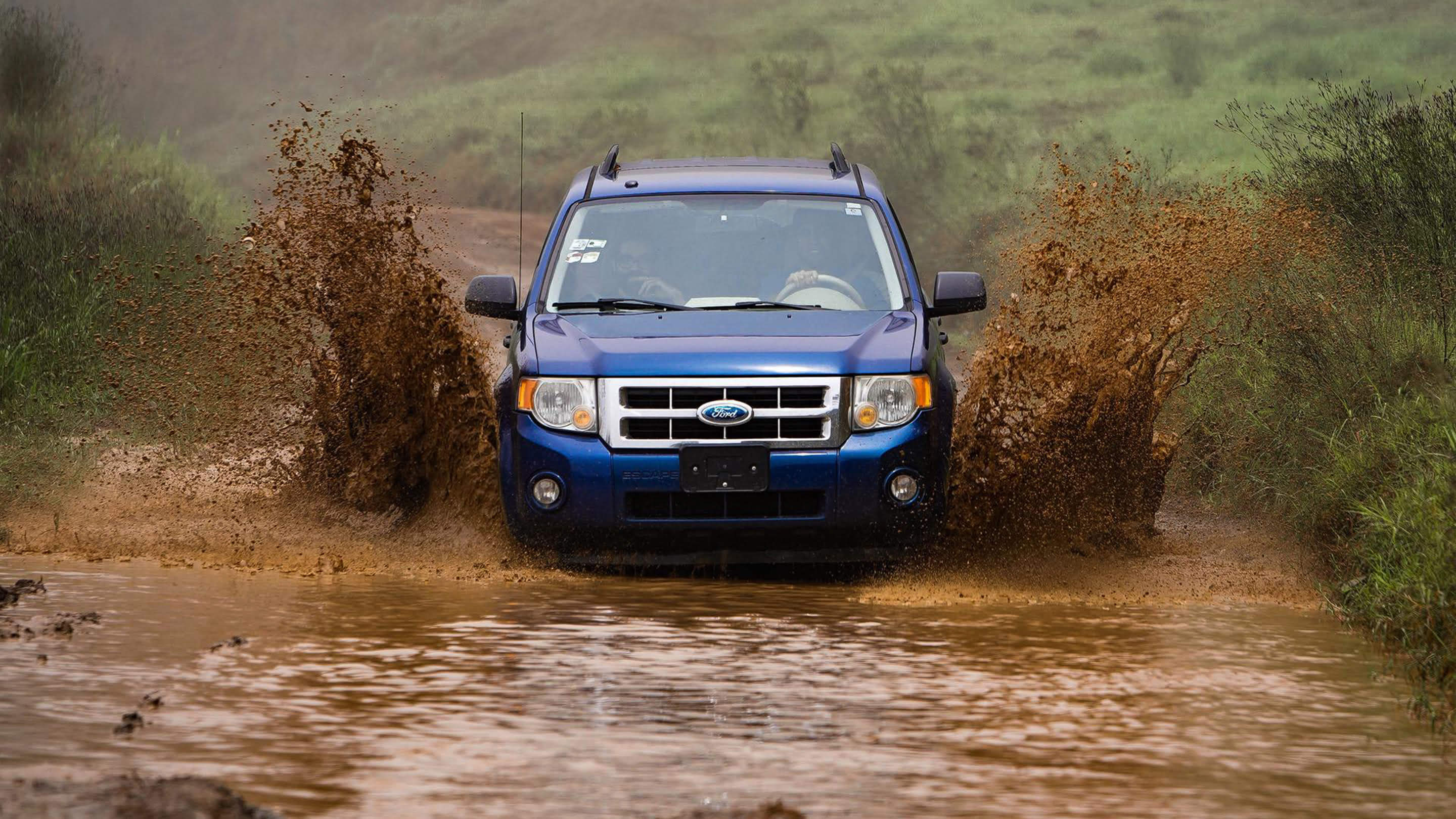 ford escape driving through mud