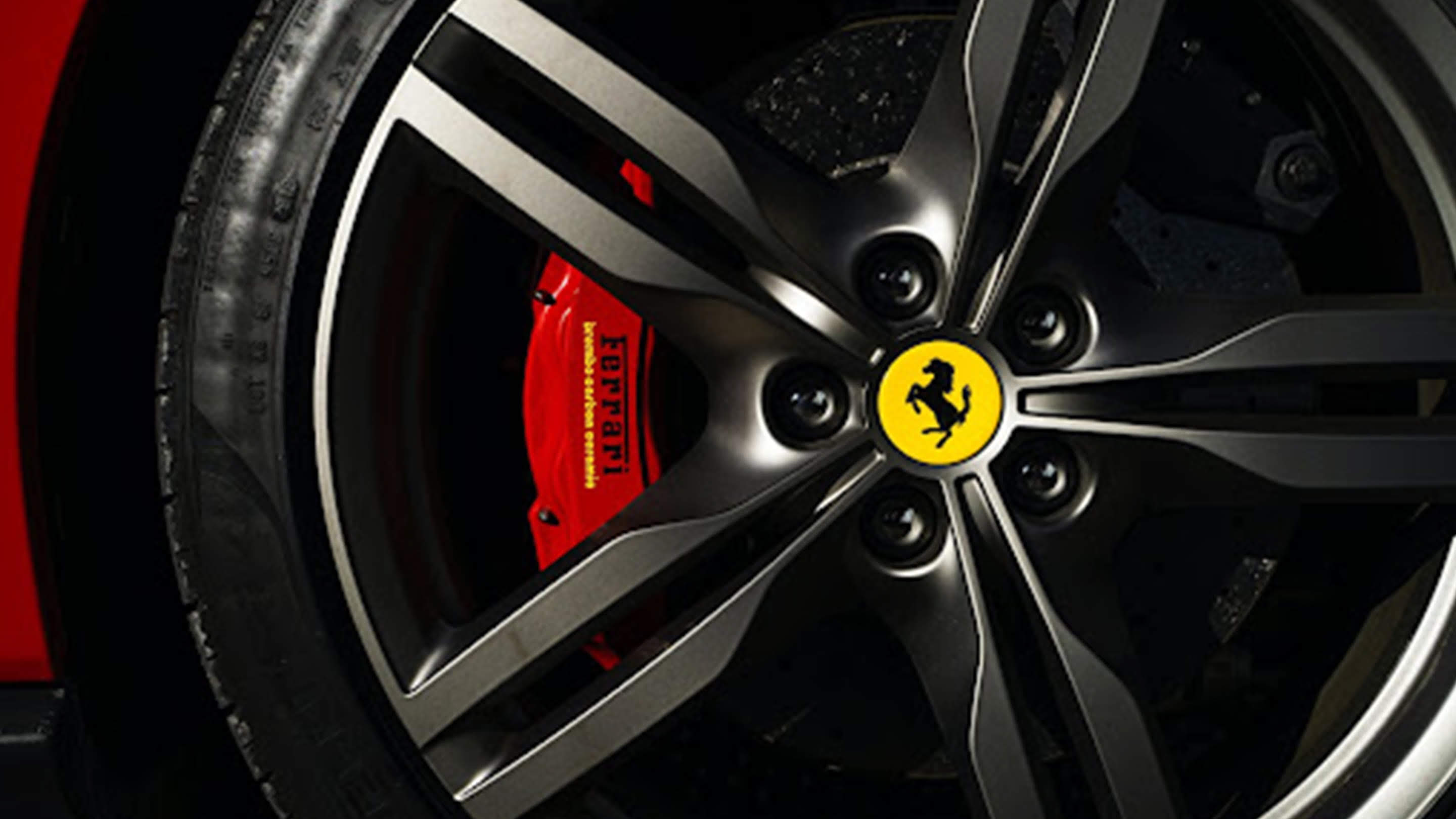 ferarri wheels and red brakes