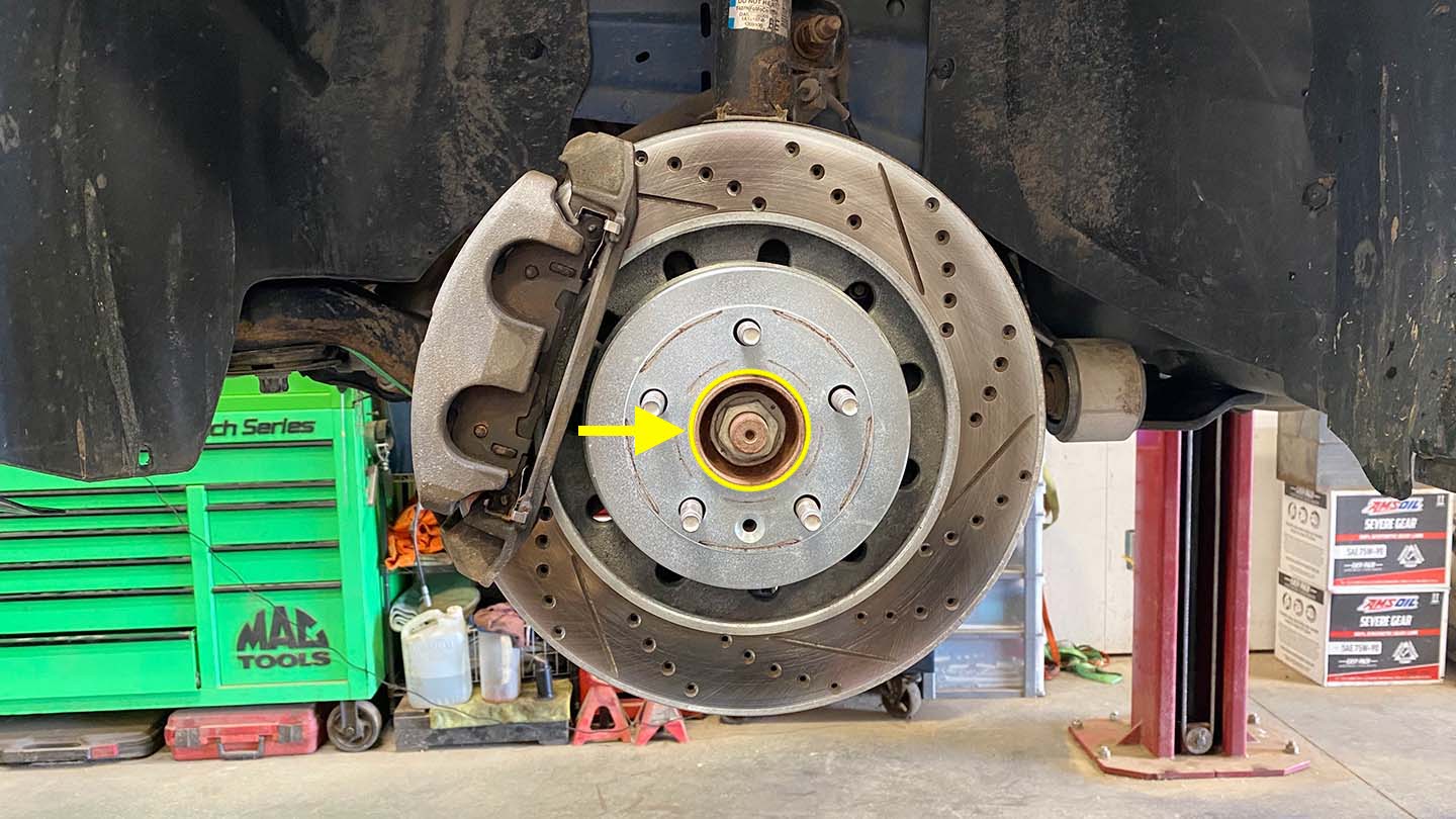 Wheel bearing hub with caliper and rotor attached