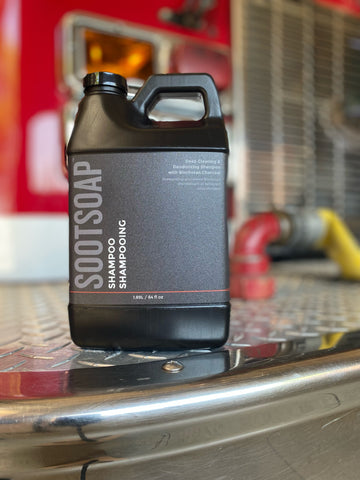 Sootsoap decontaminating shampoo 1.89L / 64oz sitting on a fire truck