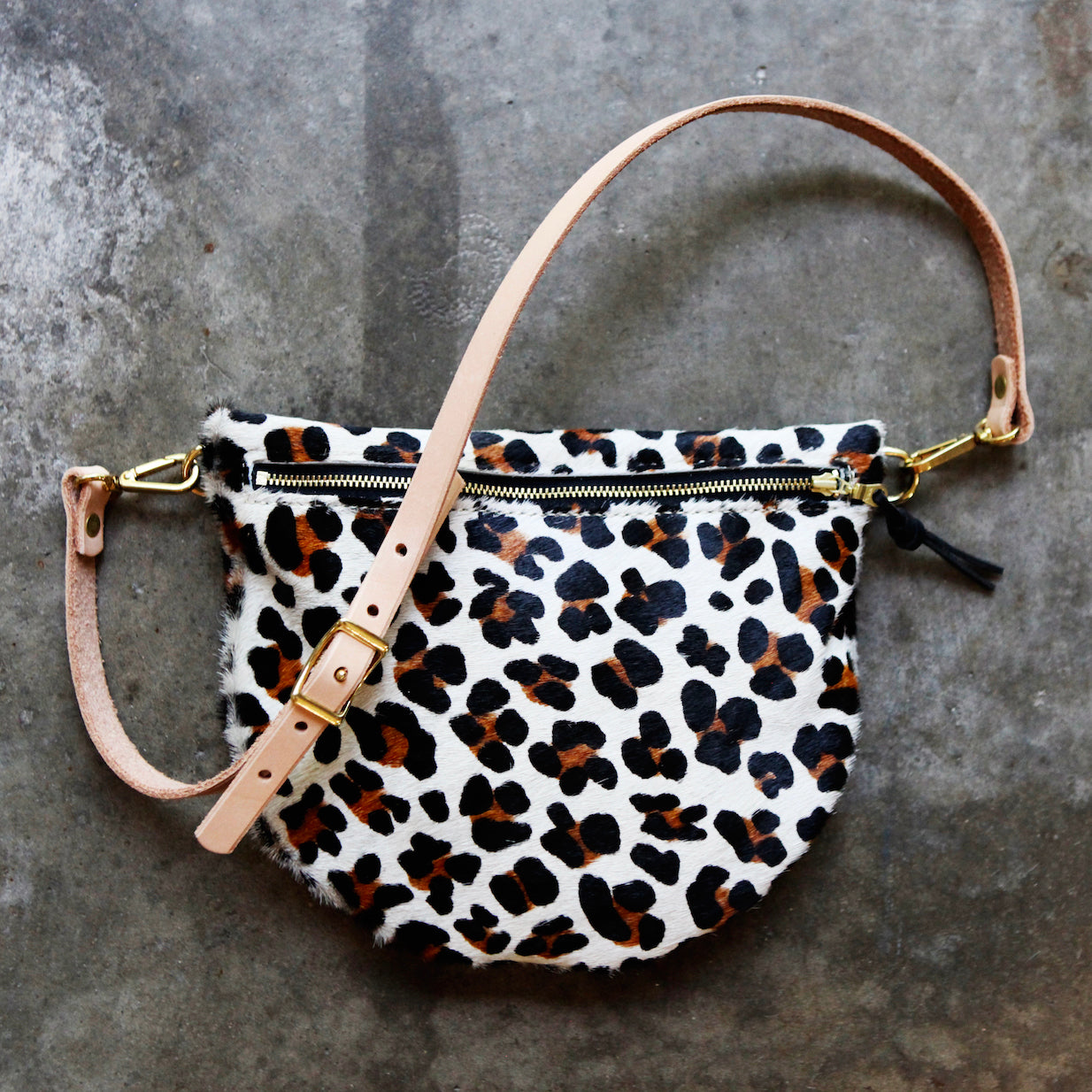 the sling, leopard hair on hide