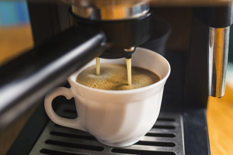 coffee-with-frothing-pouring-from-espresso-machine