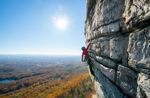 rock climber on mountain face