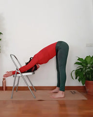 ardha uttanasana on yoga chair