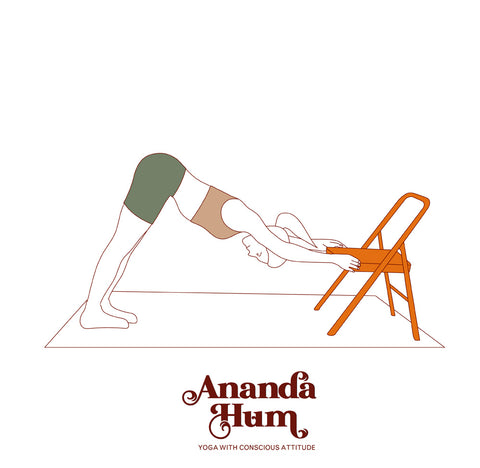 downward facing dog with yoga chair