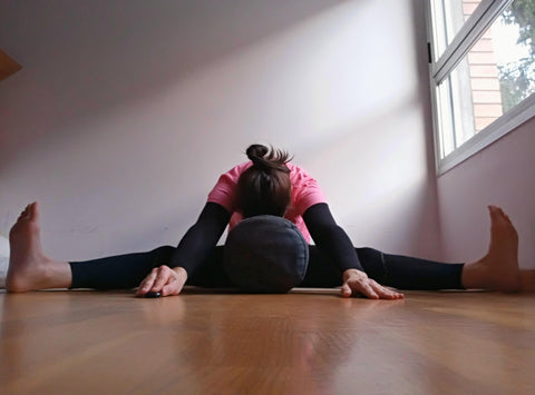 Upavistha konasana with bolster