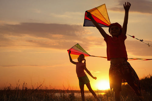 children playing with kites