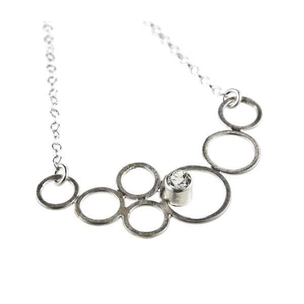 sterling silver circle necklace with a gemstone by eko jewelry design, Destina