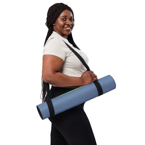 Woman carrying yoga mat in blue serenity design for meditation, yoga and Pilates.