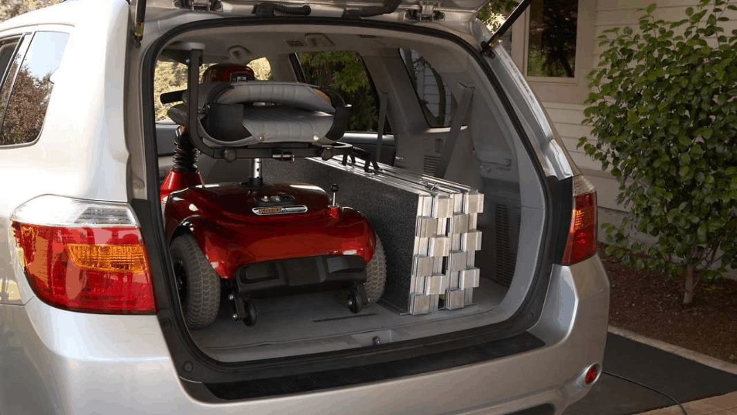 Suitcase Trifold AS stowed conveniently at the back of the van | Wheelchair Liberty