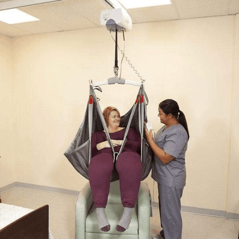 Caregiver Use Front View - C-800 Bariatric Ceiling Lift By Handicare | Wheelchair Liberty
