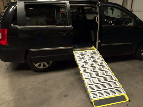 Roll-A-Ramp Manual Folding Van Ramp on Black SUV | Wheelchair Liberty