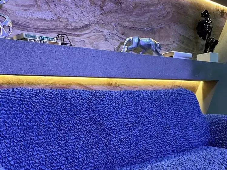 blue sofa with shelves