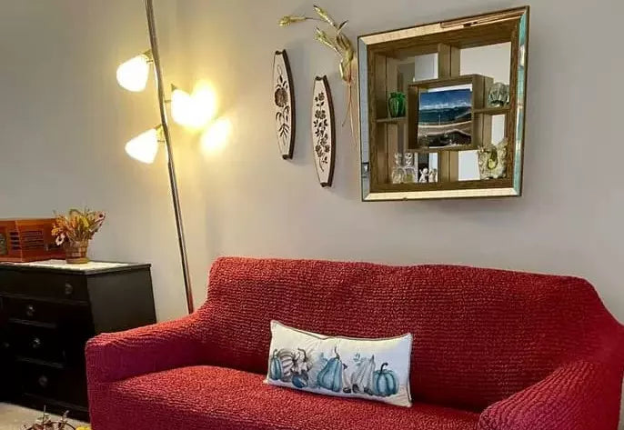 red sofa with cushion