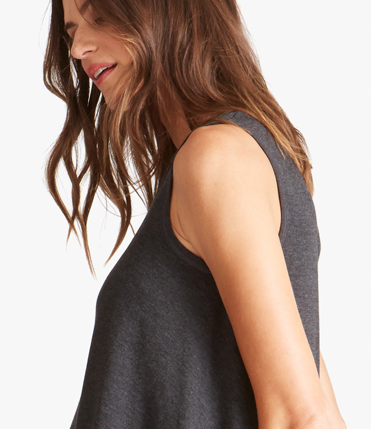 Fashion + FunctionSleeveless and loose through belly for a comfortable fit.