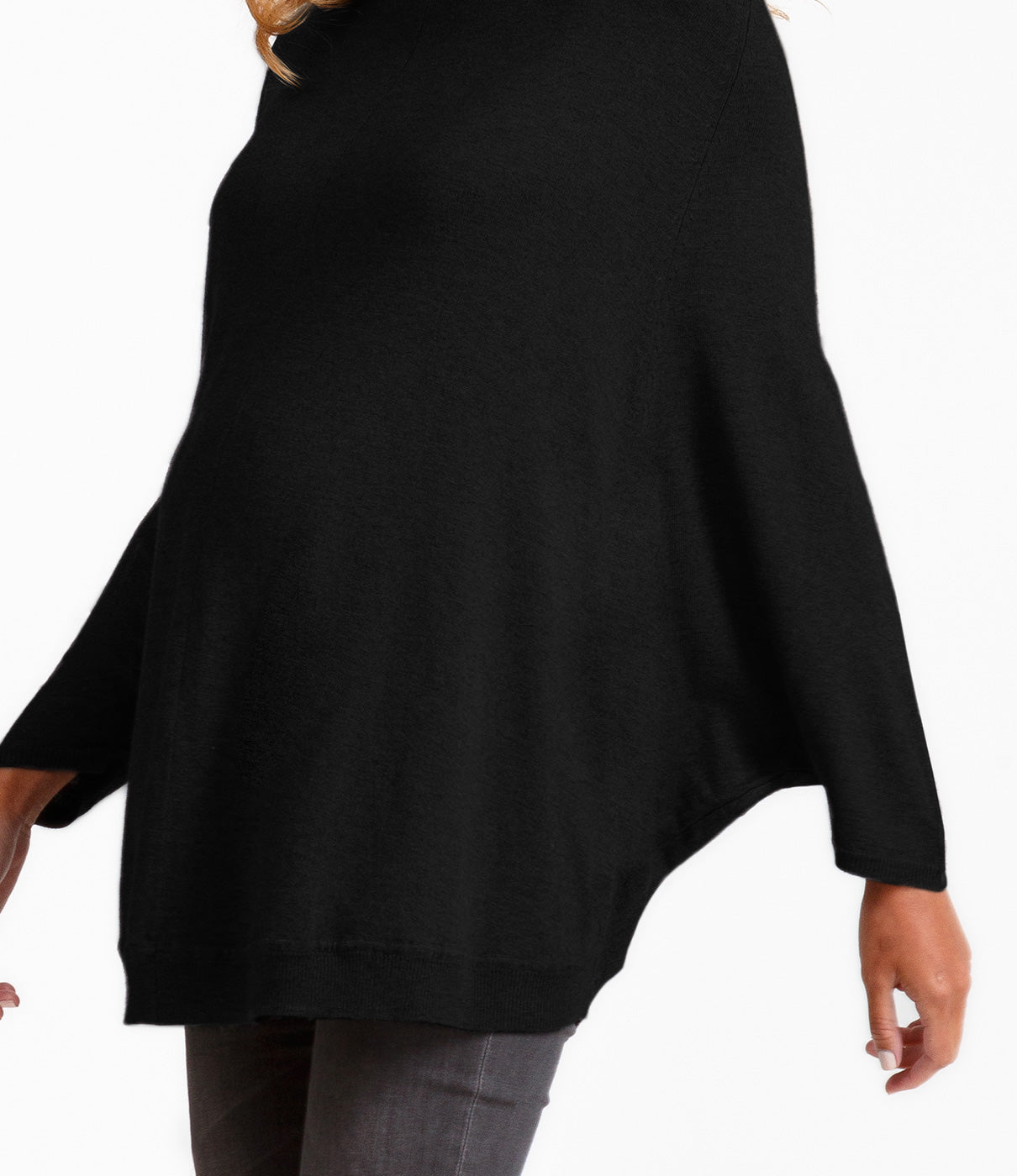 Fashion + FunctionA longer sweater style and batwing poncho sleeves provide maximum backside and arm coverage.