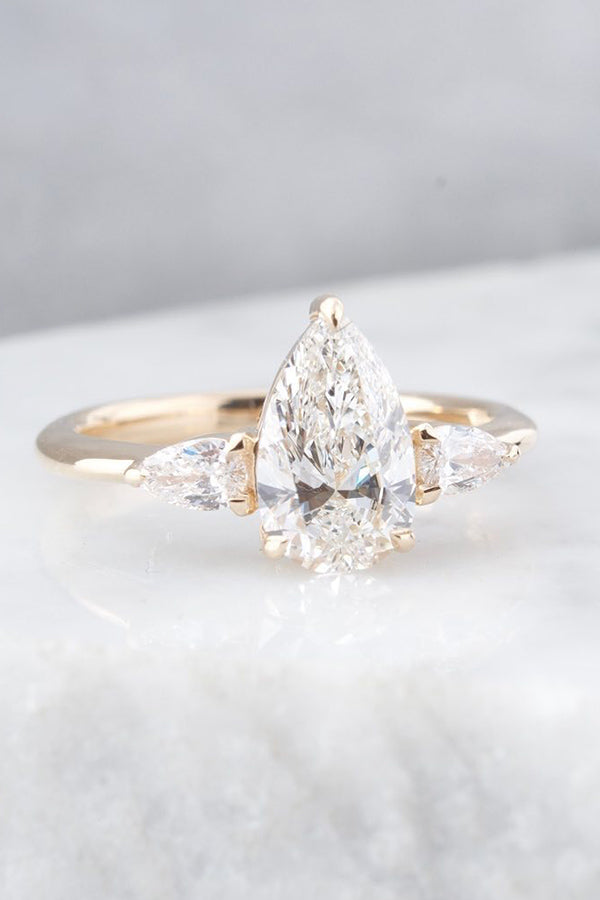 Pear Cut Engagement Ring with Pear Accents