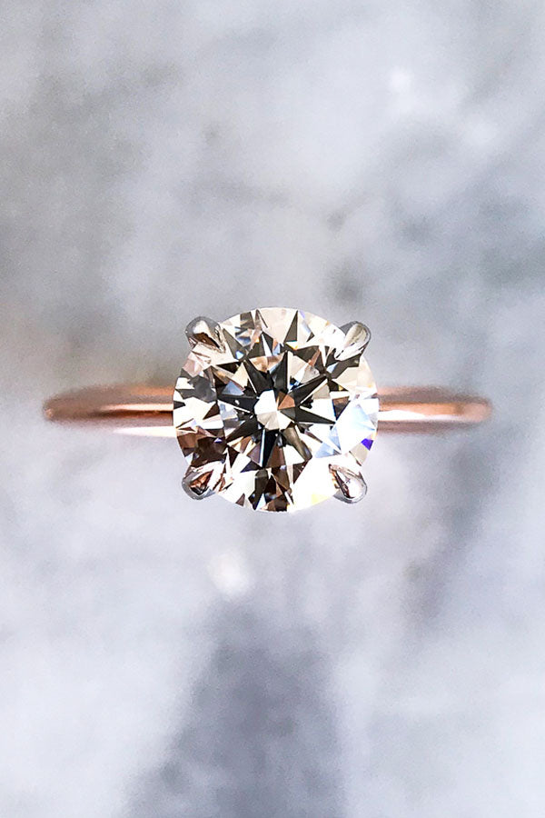 Simple Round Cut Diamond Engagement Ring in Rose Gold