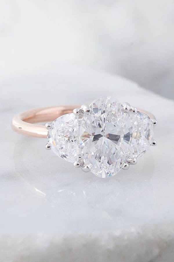 Dainty Three-Stone Engagement Ring with Half Moon & Oval Diamonds