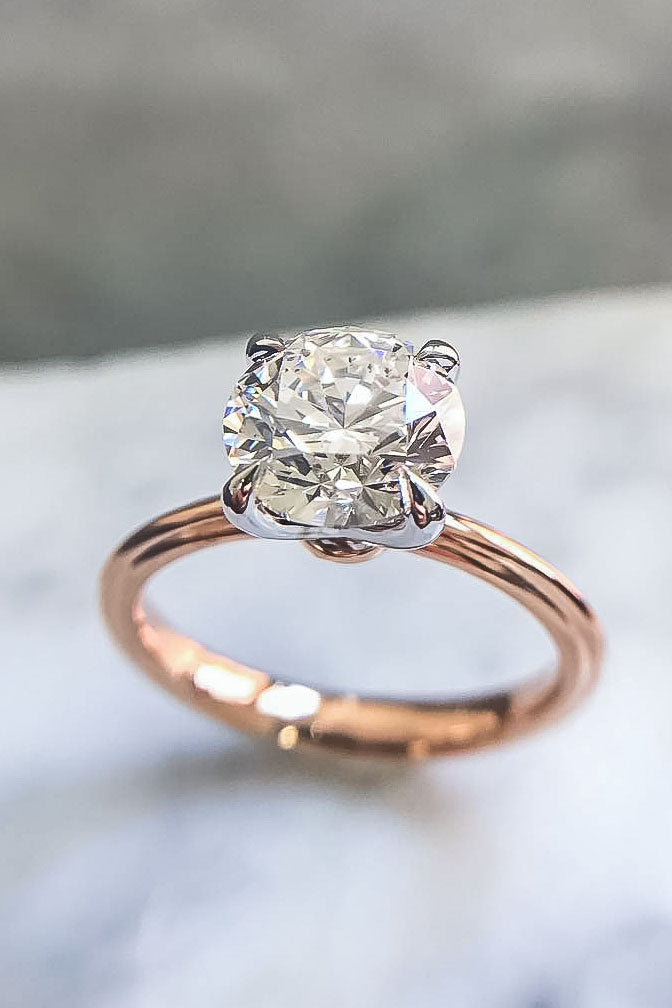 Simple Solitaire Engagement Ring with Round Cut Diamond