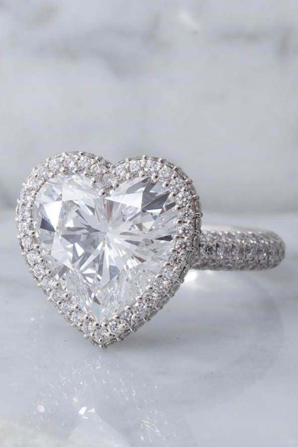 Round Cut Engagement Ring with Assymetric Diamond Clusters