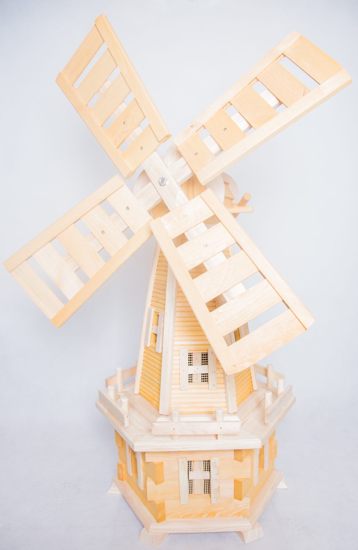 Handcrafted wooden windmills in various designs - charming garden decor with a touch of rustic elegance Pendle Windmills