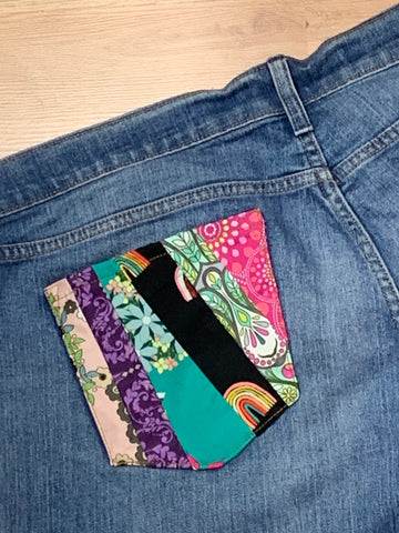 pocket sewn to jeans