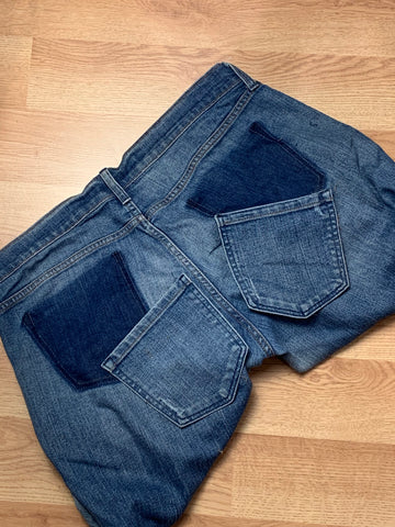 pair of jeans with pockets removed