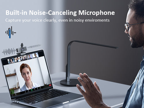 A man is using the N60 Pro camera for a video call, featuring a built-in noise-canceling microphone