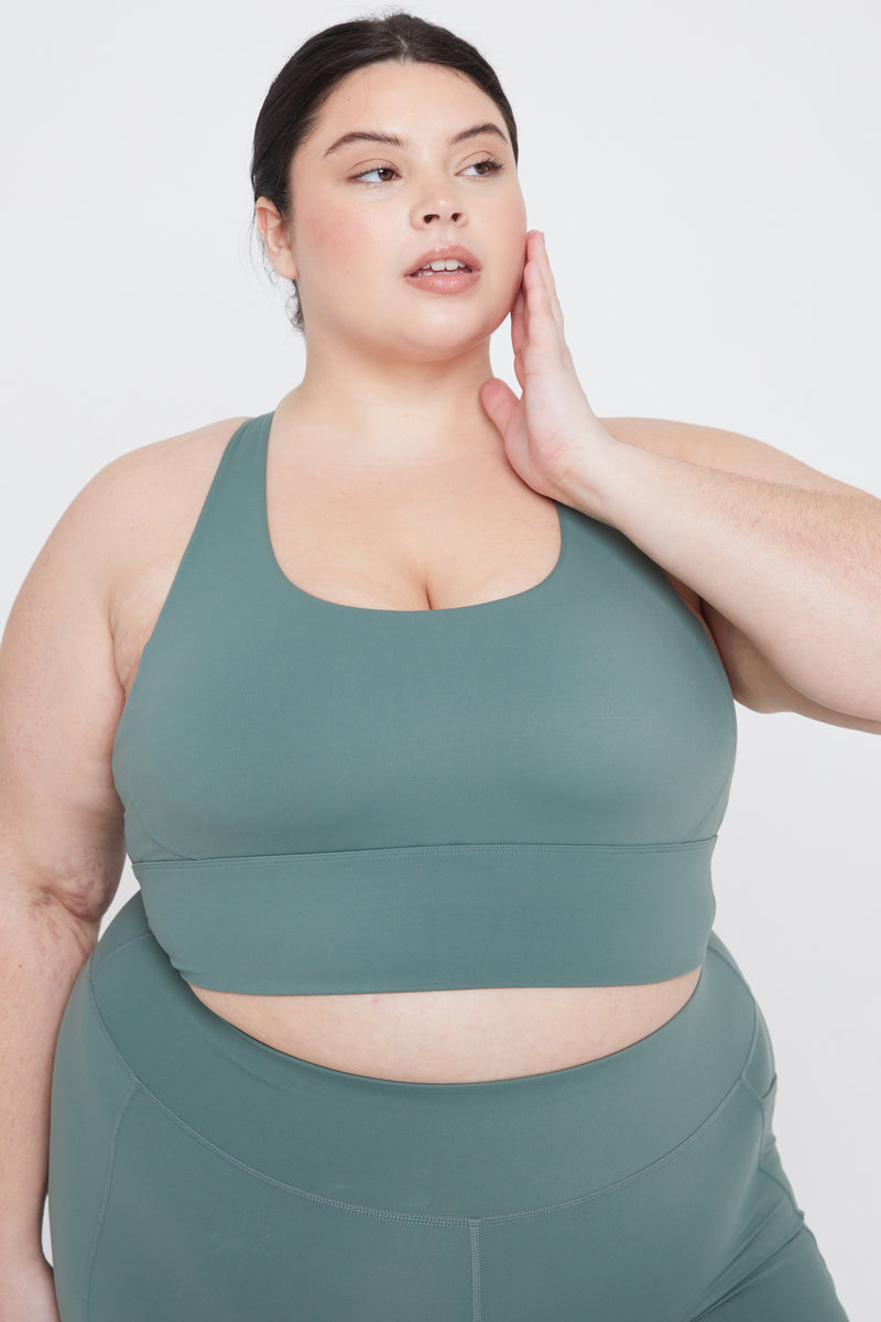 TALA Skinluxe medium support sports bra in sage green exclusive to ASOS