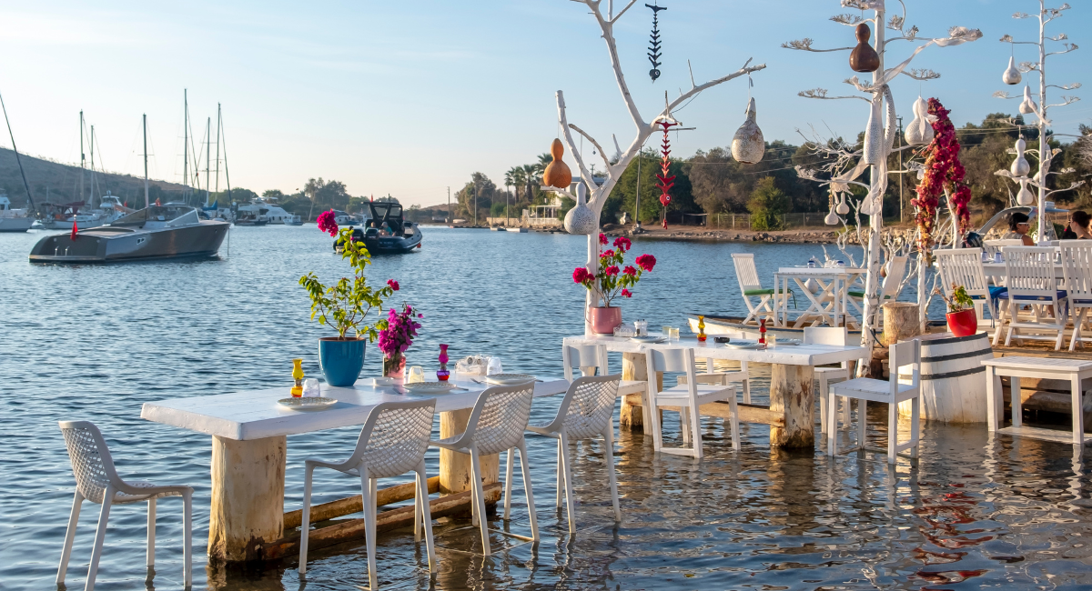Yachts & restaurants on the Gumusluk coast in Bodrum, Turkey