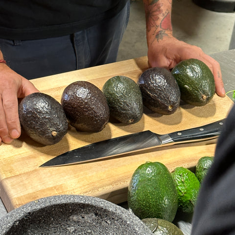 Davocadoguy preparing perfectly ripened avocados for a tutorial on how to best chose avocados. 