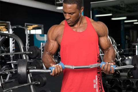 Strong Man with Gauntlet Gripz thick bar attachment on ez curl bar