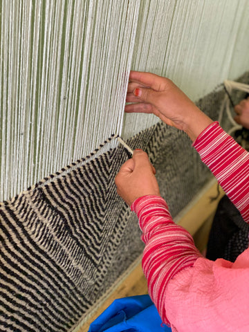 Hands at the loom