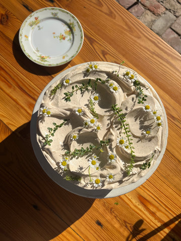 bayou saint cake kola goodies milk tea infused cake ricotta filled zoomed out porcelain dish