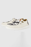 Heydude Women Wendy Cow Print Shoes In White/black